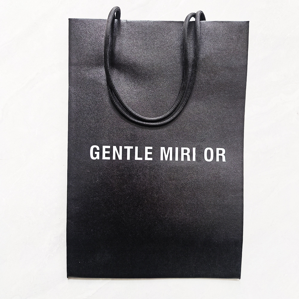 Sac fourre-tout noir avec inscription