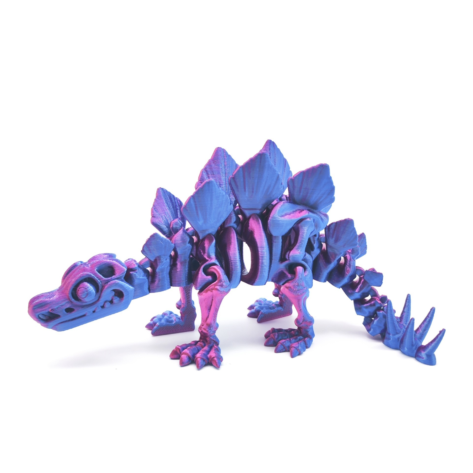 Stégosaure rouge-bleu 23CM