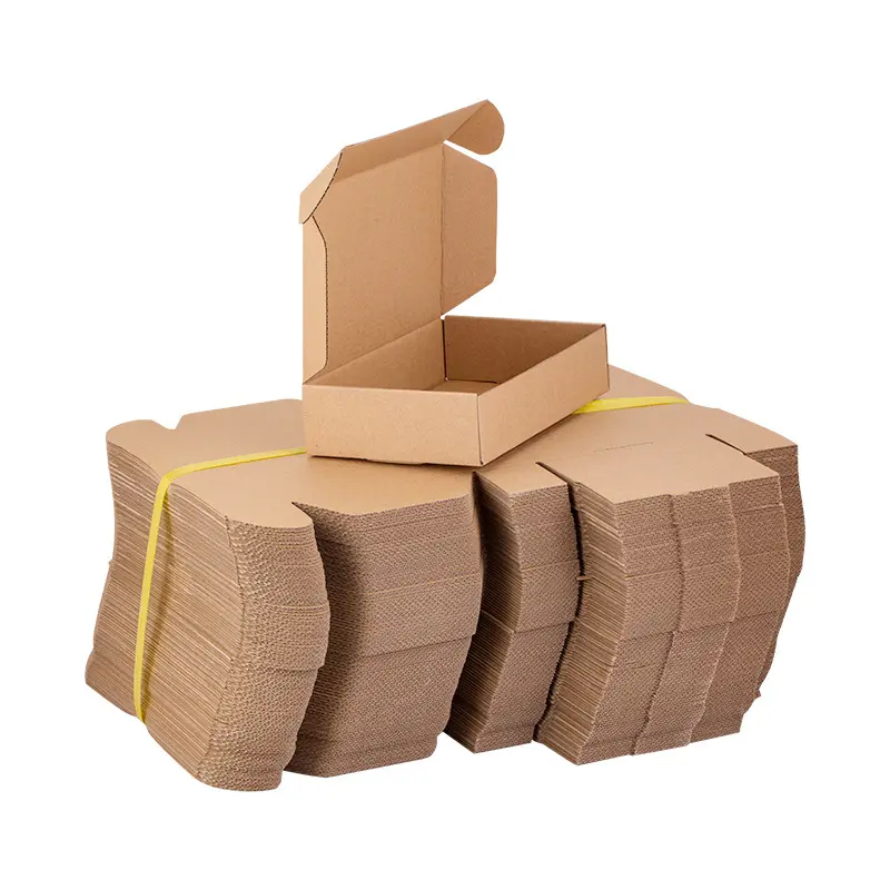 फ़ैक्टरी कस्टम प्रिंट कार्डबोर्ड शिपिंग बॉक्स क्राफ्ट नालीदार पेपर पैकेजिंग बॉक्स थोक ब्रांडेड परिधान मेलर बॉक्स