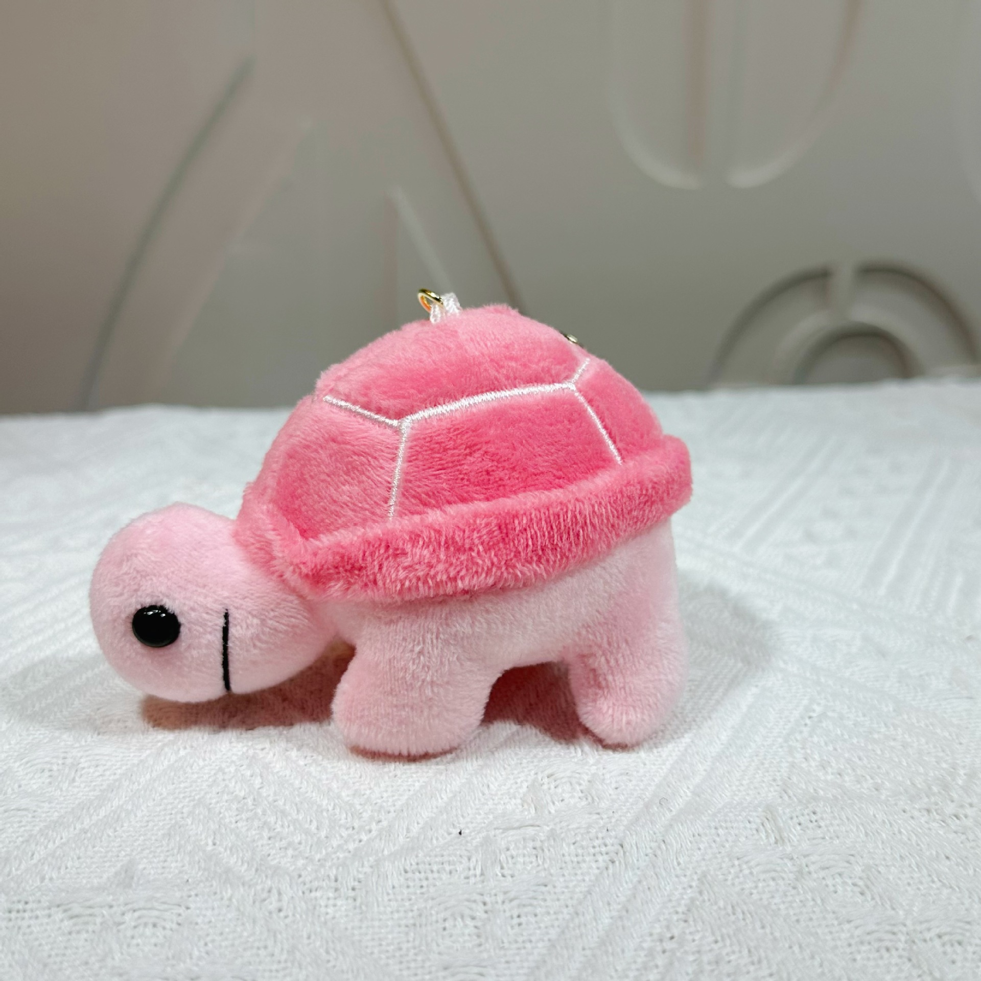 Peluche tortue-boucle dorée couleur unie rose