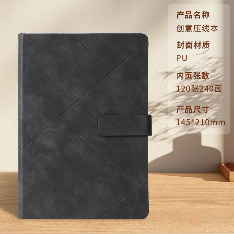 Libro con hebilla prensada en negro.