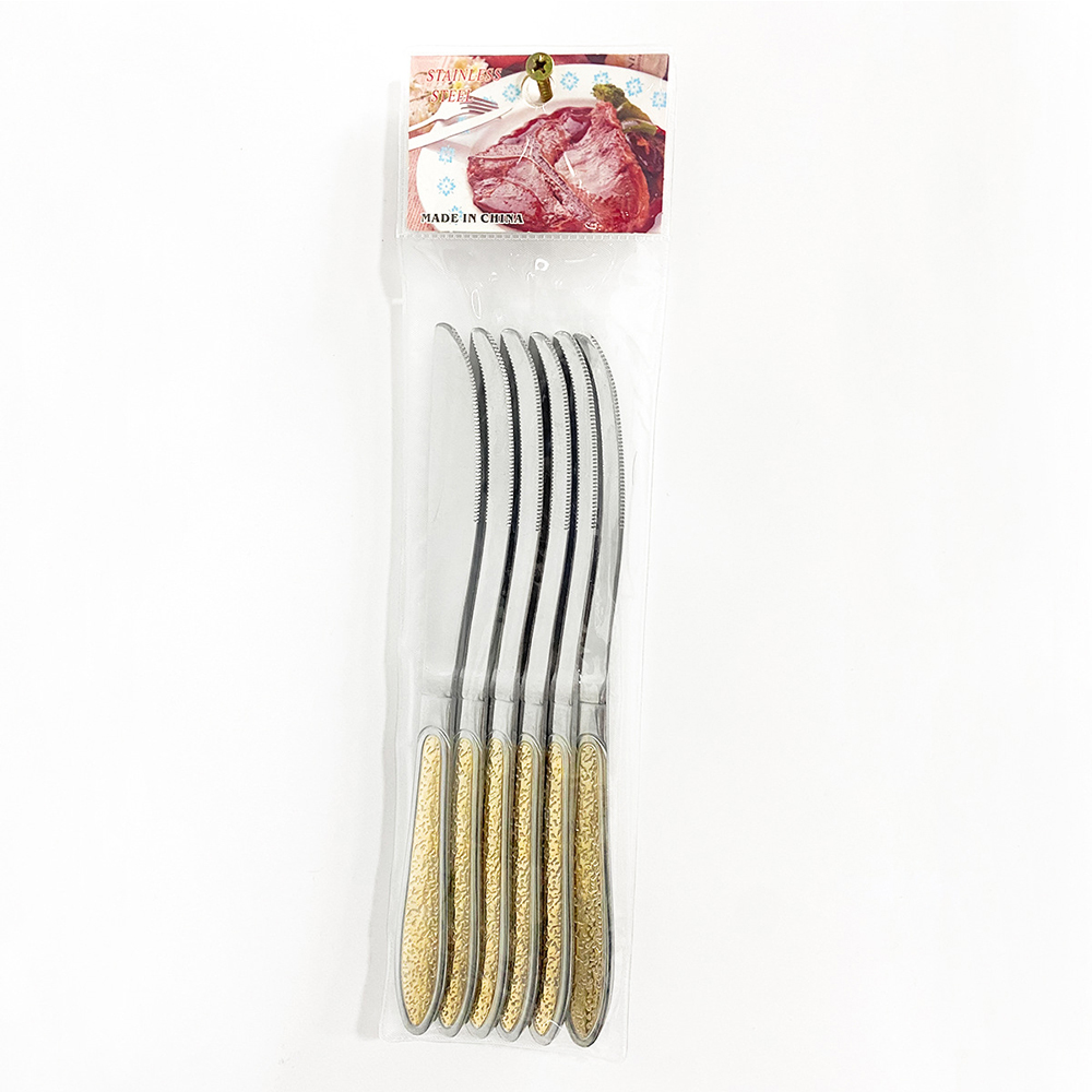 Cuchillo de mesa dorado
