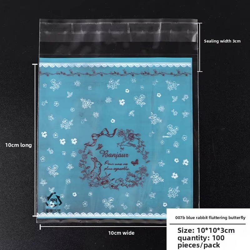 007B Lapin Papillon avec Fond Bleu 10 * 10cm