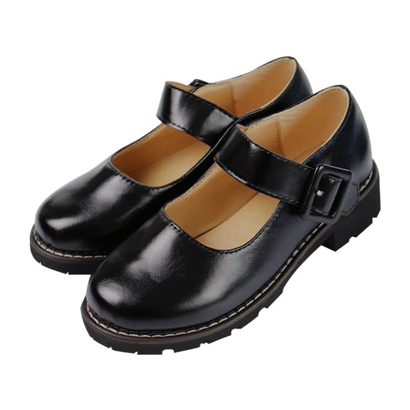 White-stitched leather shoes