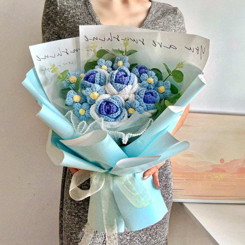 5 finished blue yarn bouquets