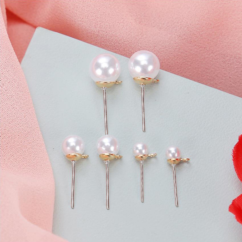 Boucles d'oreilles à tige en perles avec base en or KC pendante