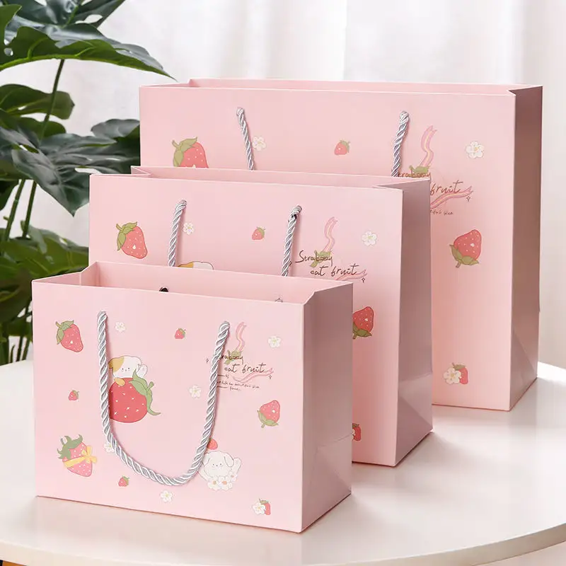 Bolsa de papel rosa con logo personalizado, bolsa de papel con asa de cinta, venta al por mayor