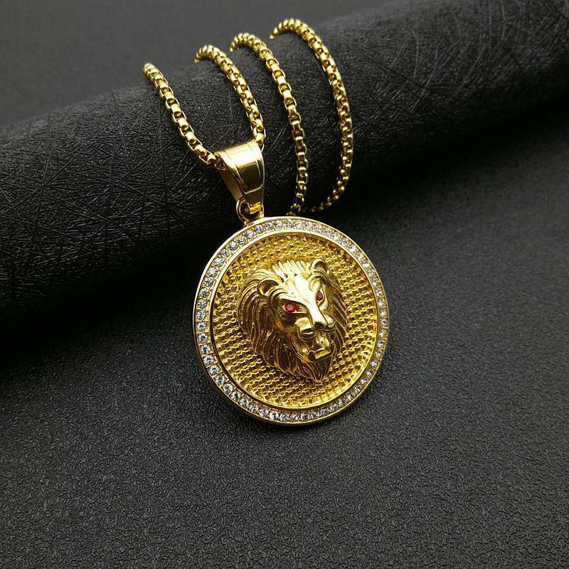 Pendentif unique œil rouge doré