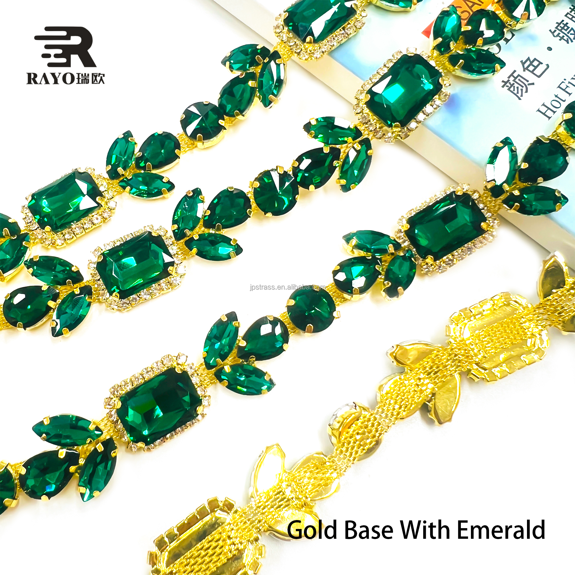 Gold base with emerald