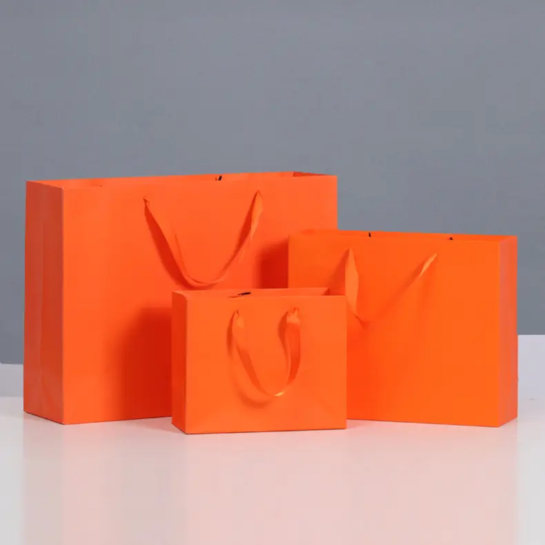 مخصص طباعة الشعار الخاص بك بوتيك حقيبة يد أكياس تغليف البرتقال الأزياء والإكسسوارات ورقة التعبئة والتغليف حقيبة تسوق