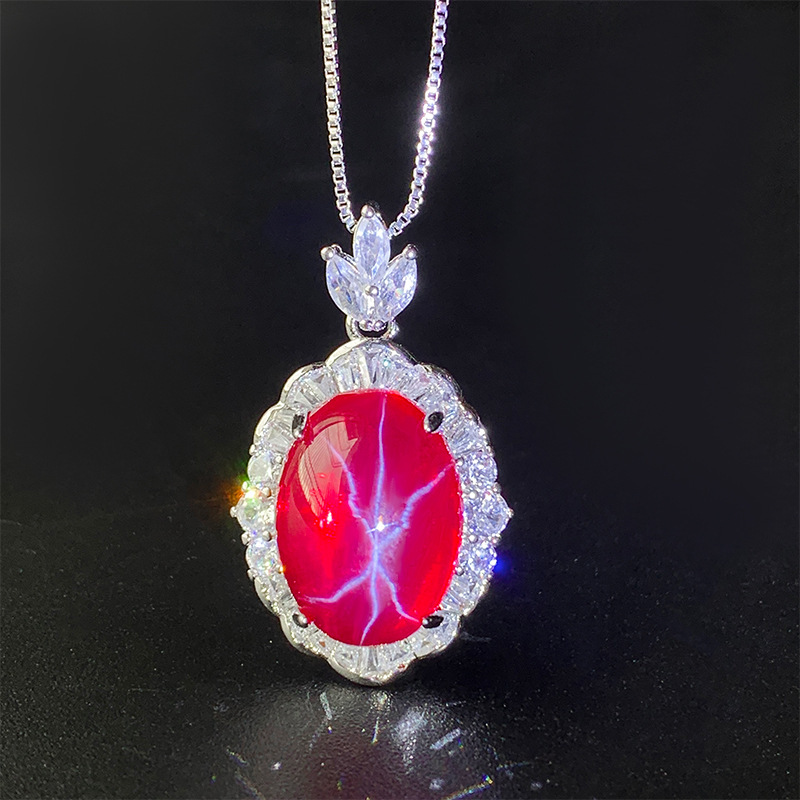 Pendentif étoile lumineuse à six branches en corindon rouge