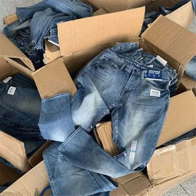 Jeans rasgados para homens jeans rasgados personalizados lotes de estoque excedentes jeans