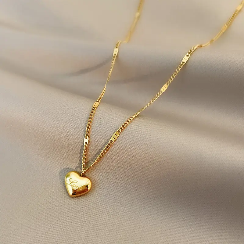 Collar de acero y titanio chapado en oro de 18K, cadena de clavícula con colgante de corazón y temperamento simple, joyería de verano