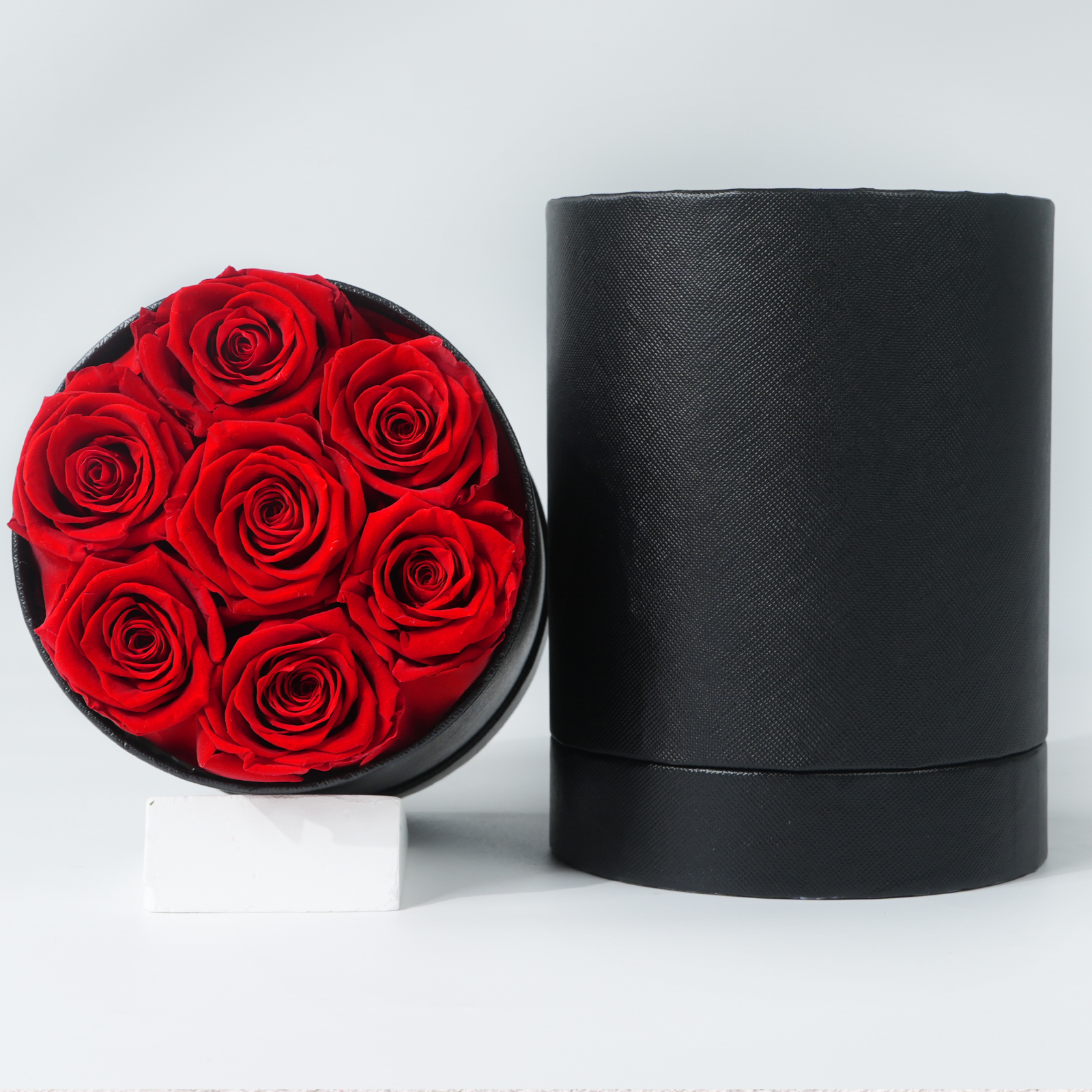 7 Roses In Round Box