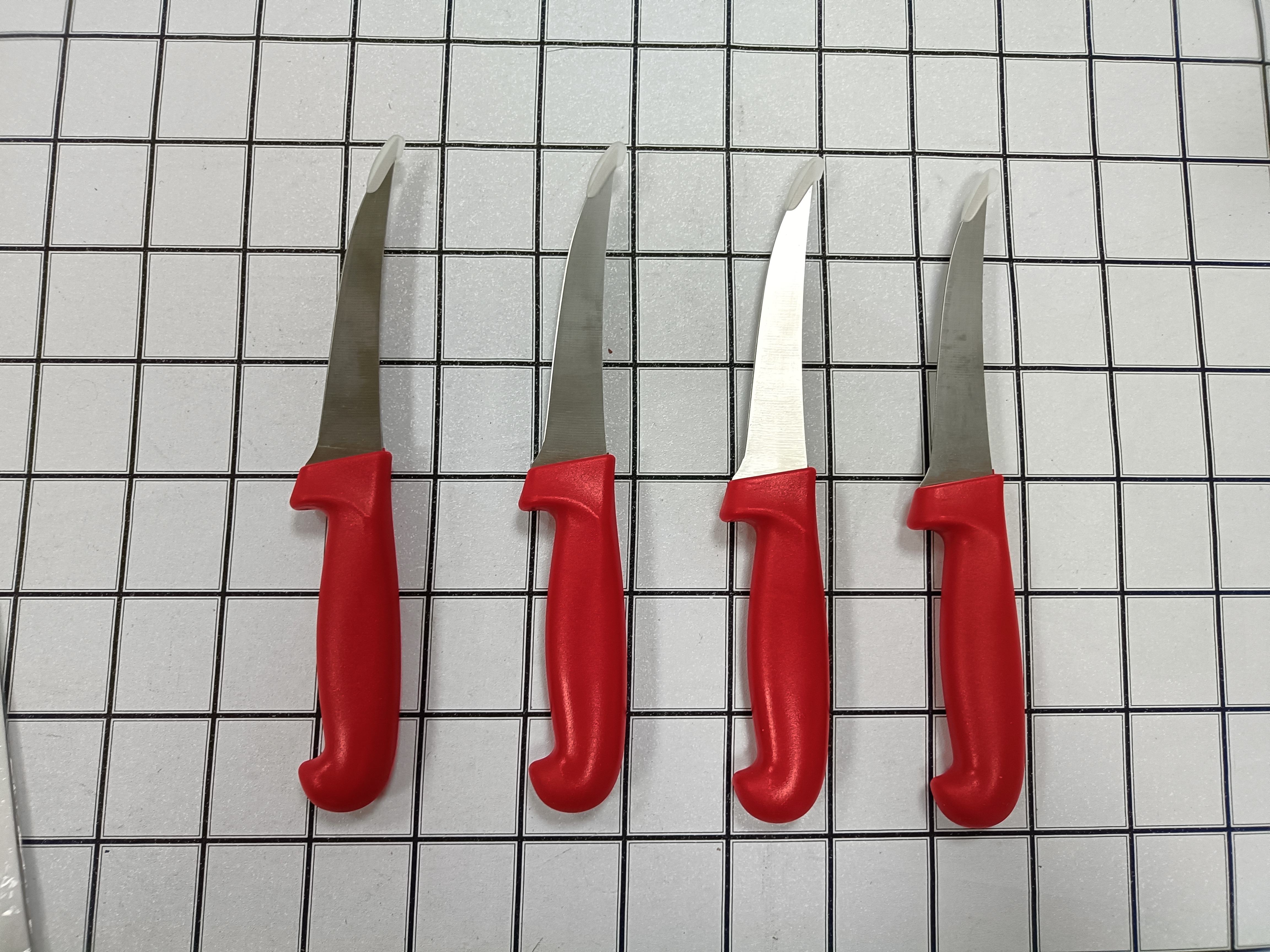 coltello kiristuke con manico rosso