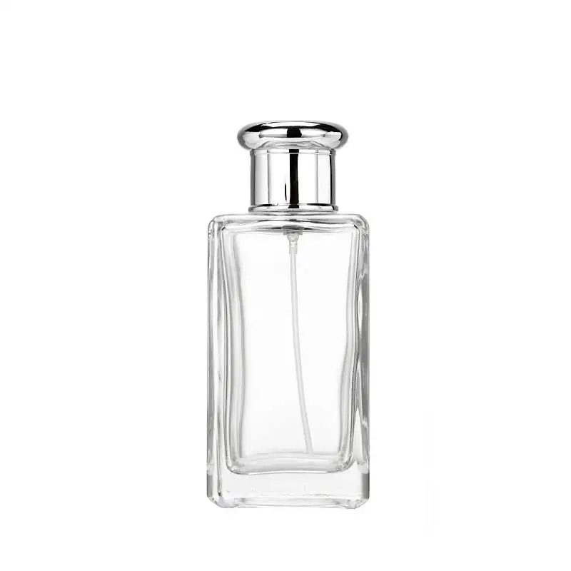 Factory Outlet 50ml Envases cosméticos de vidrio transparente cuadrado Bomba de lujo Pulverizador Botella de perfume