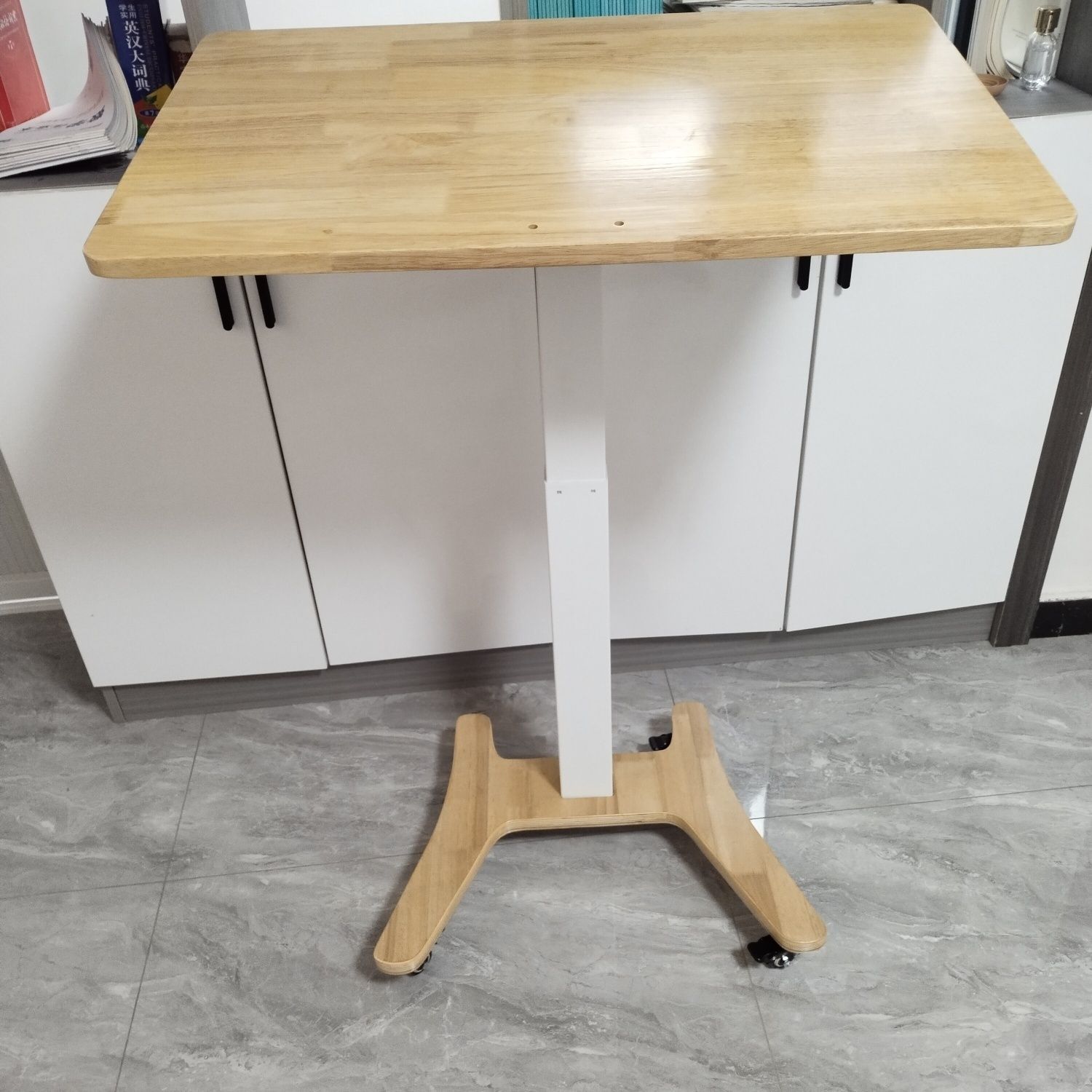 One light wood-colored single table
