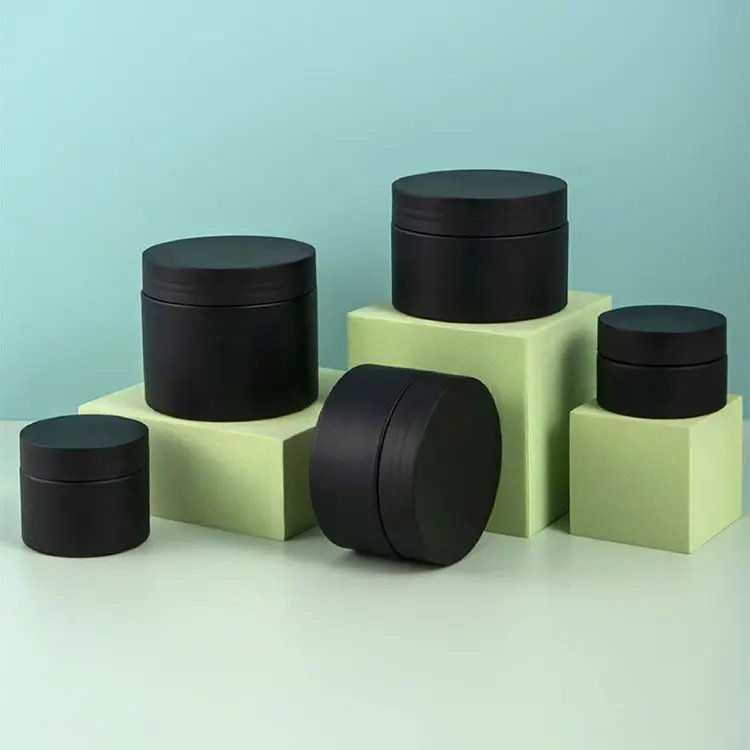 Pot rond en plastique PET noir givré personnalisé de 30ml 50ml 100ml pour rouge à lèvres et ombre à paupières en PVC et PP