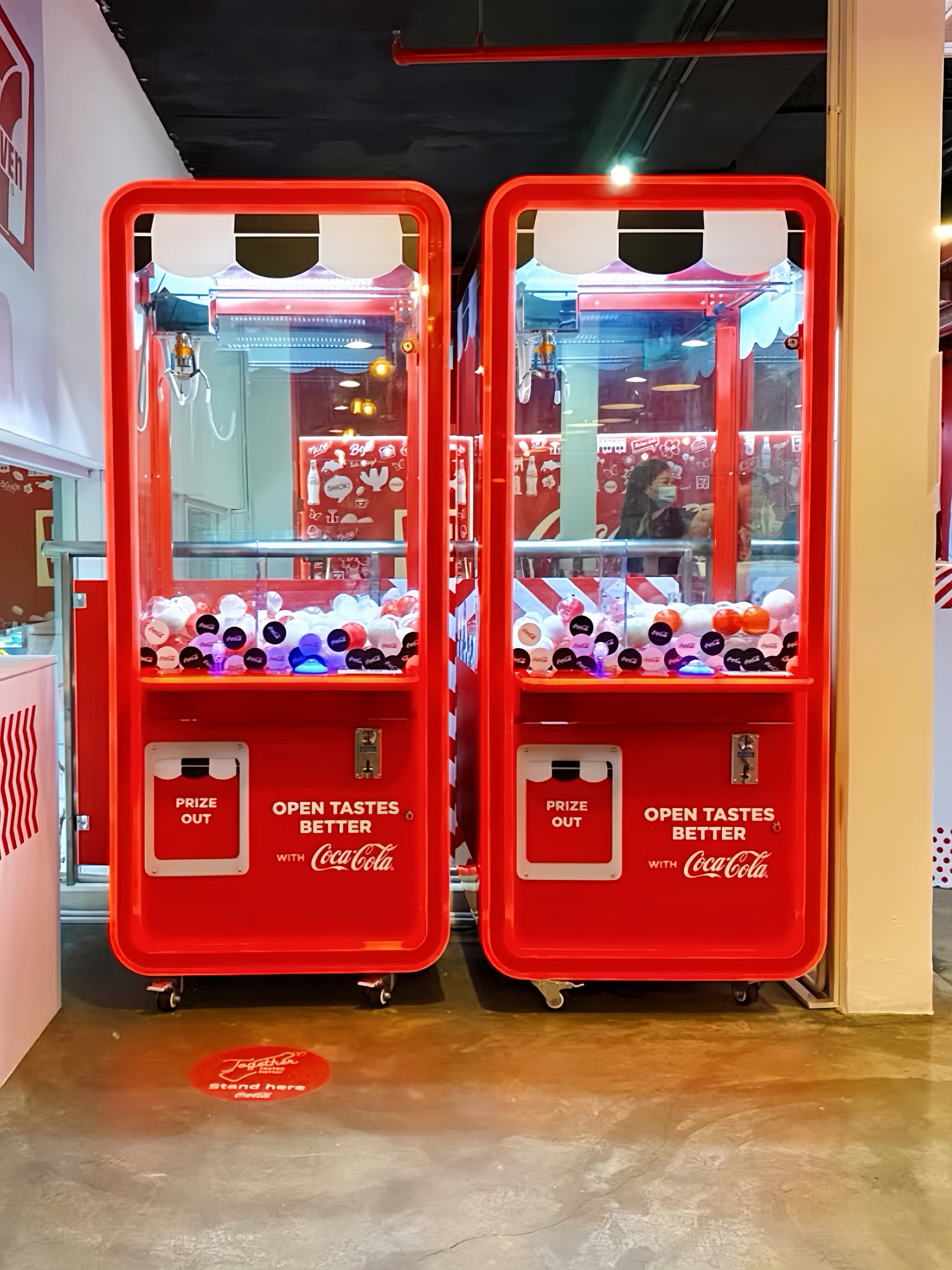 Fully transparent red doll machine