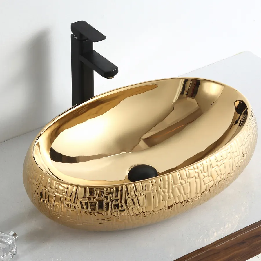 Lavandino d'arte all'ingrosso della cina Lavabo da bagno in ceramica Lavabo di lusso Lavabo da tavolo ovale elettrolitico in oro