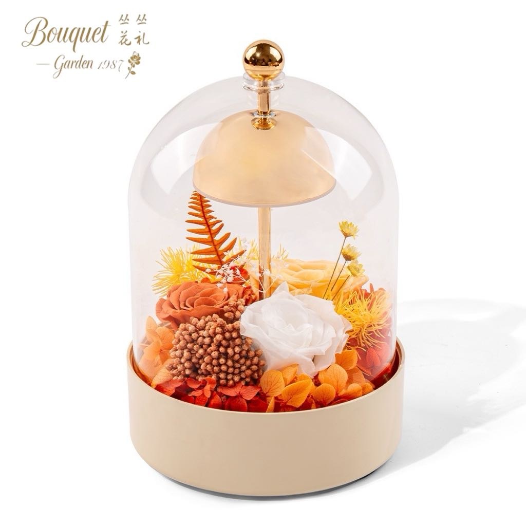 Naranja con caja de regalo