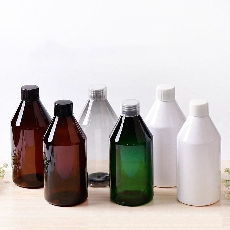 ขวดสีเหลืองอำพันพร้อมฝาสกรูสีดำ