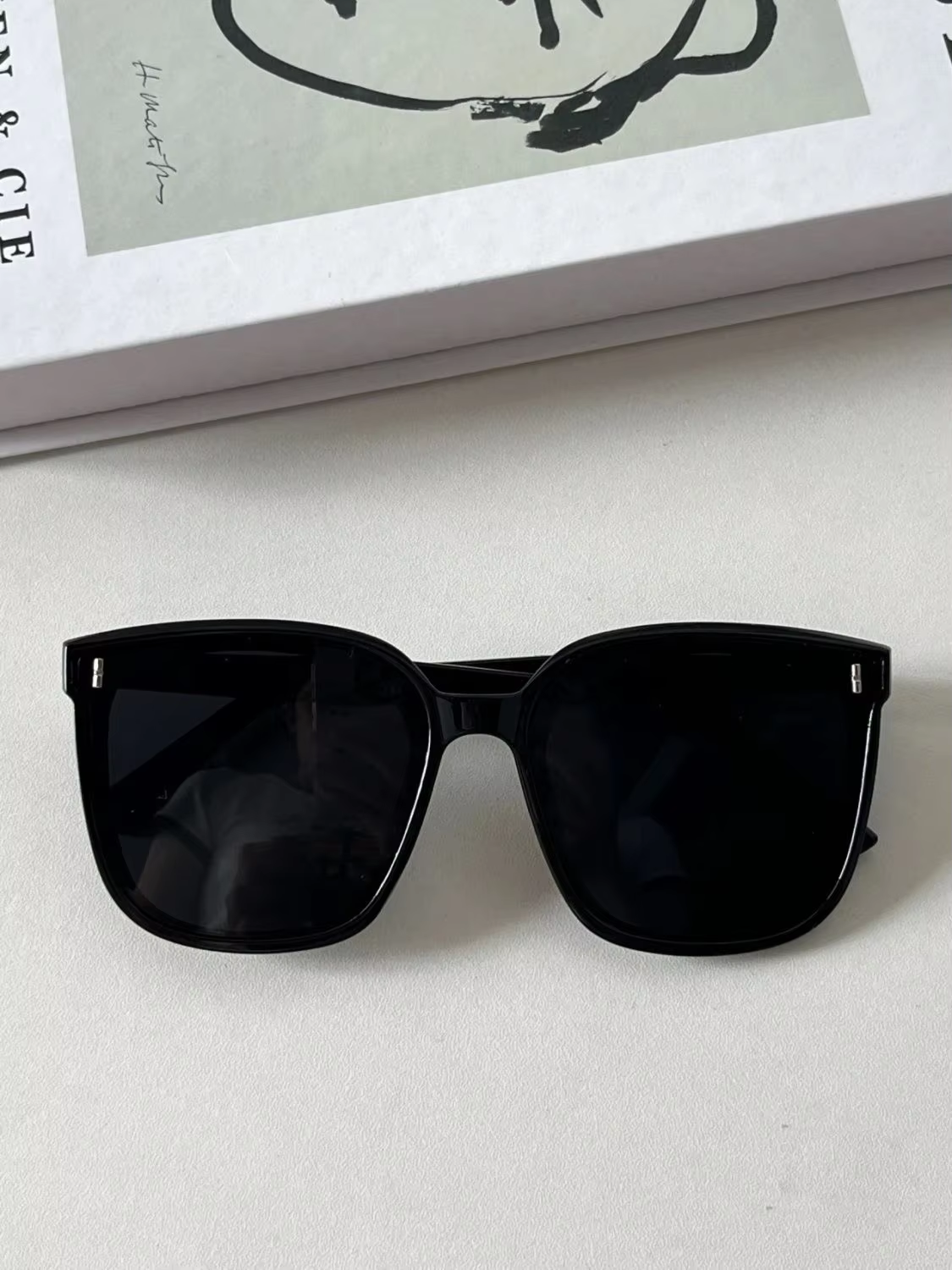 Black frame black lens