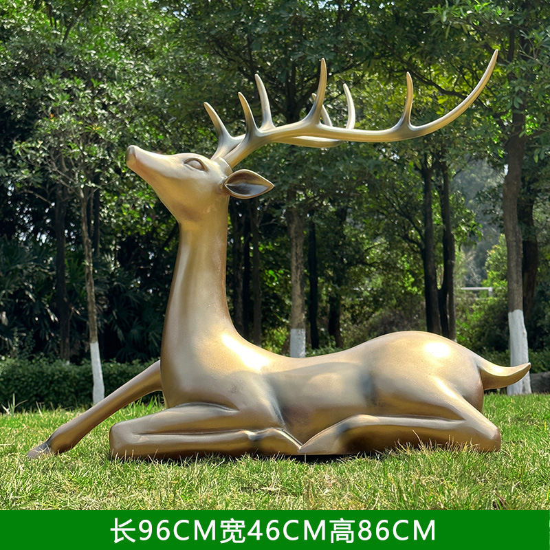Cerf couché couleur cuivre