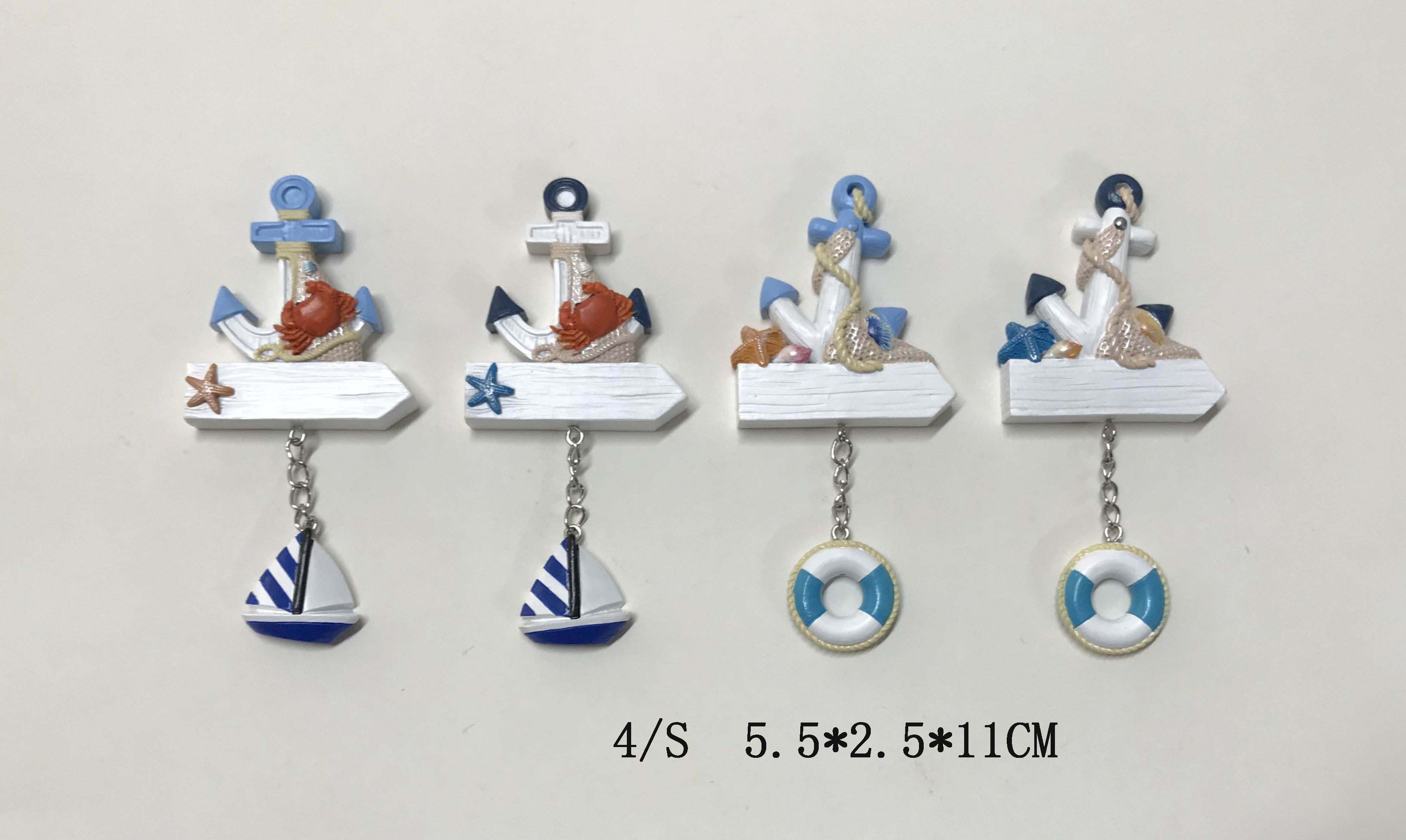 Ancla con estatuilla de velero
