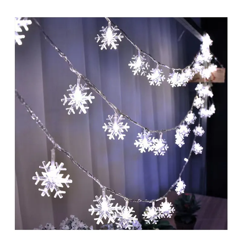 Urlaub führte Schnee laterne Schnur dekorative Lichter Netz roten Hintergrund kleine blinkende Batterie Lichter Weihnachts feier