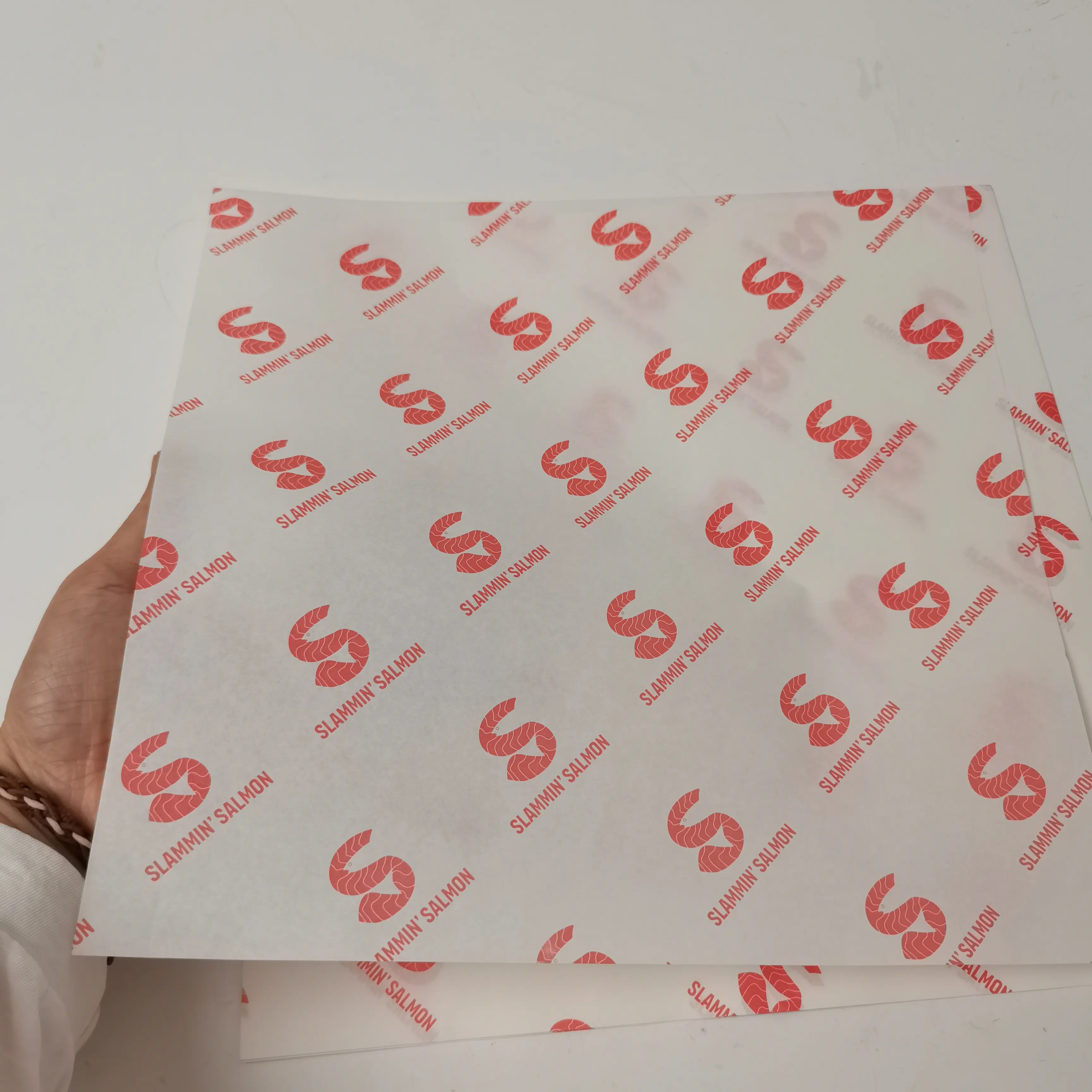 Logo personalizzato di alta qualità dimensioni resistente al grasso per alimenti imballaggio sicuro carta cerata carta sandwich oleata