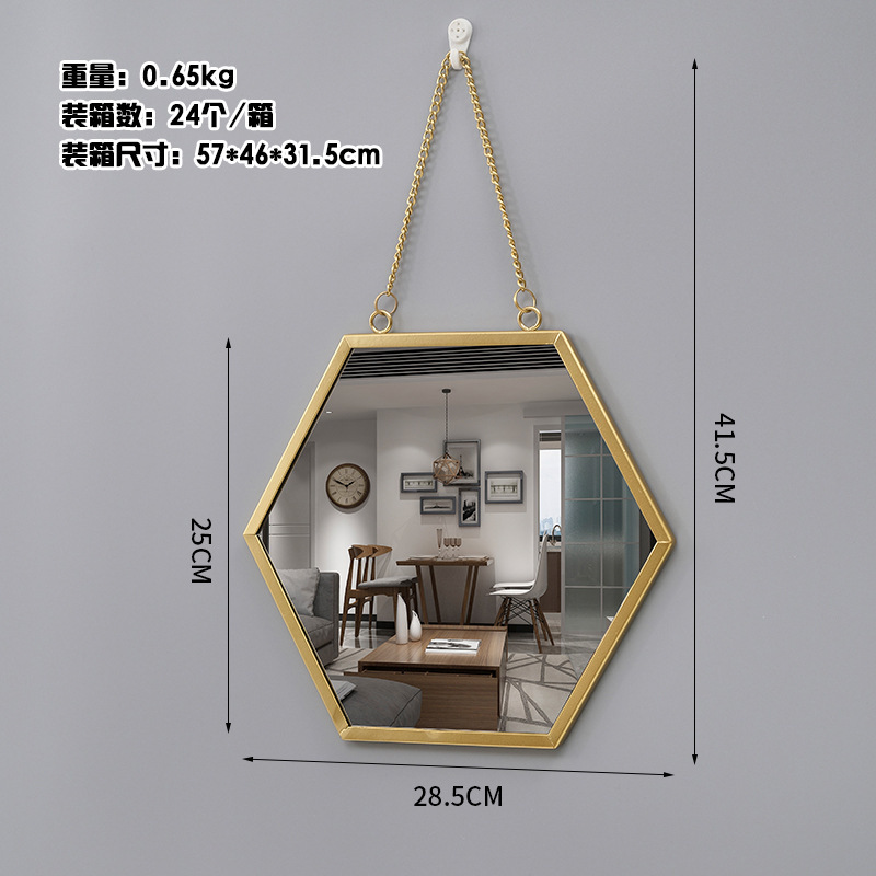 Small wall-mounted hexagonal mirror - gold - property investment