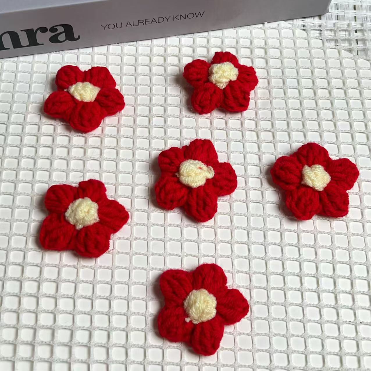 Lana trenzada Flor de soplo rojo grande