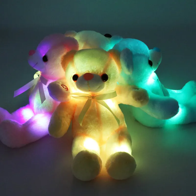 2024 fábrica al por mayor en Stock 22cm suave noche resplandor compañero muñeca oso de peluche regalos para niños juguete de peluche iluminado Led oso de peluche