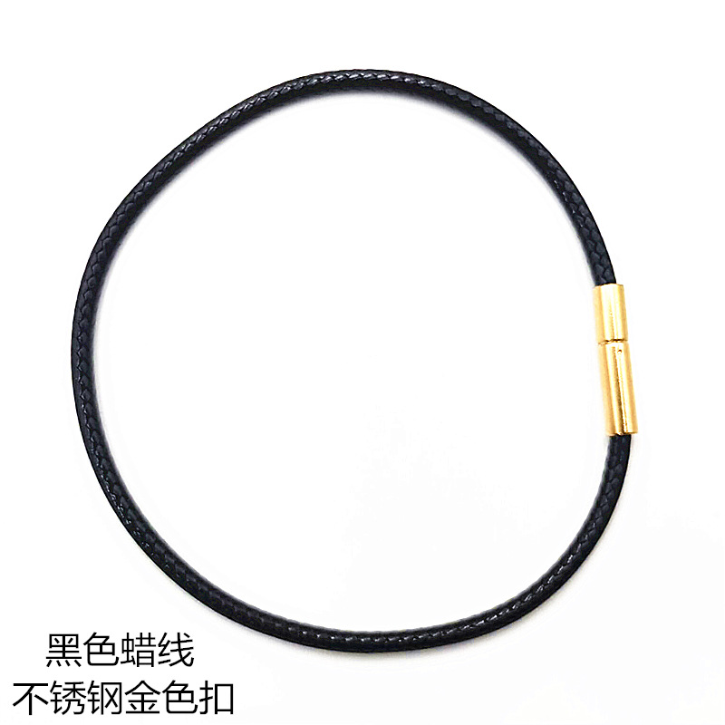 Black waxed thread with gold clasp