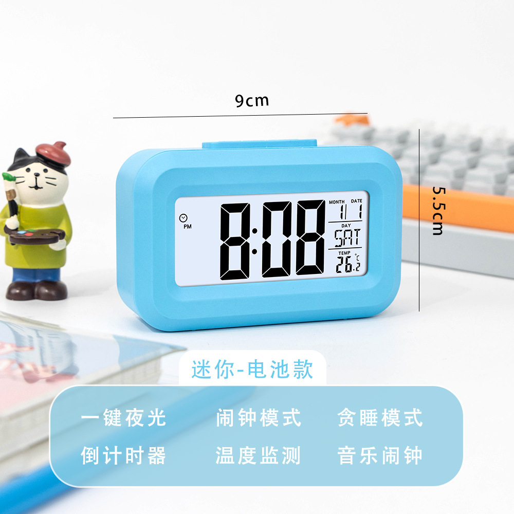 Reloj despertador multifuncional azul que brilla en la oscuridad