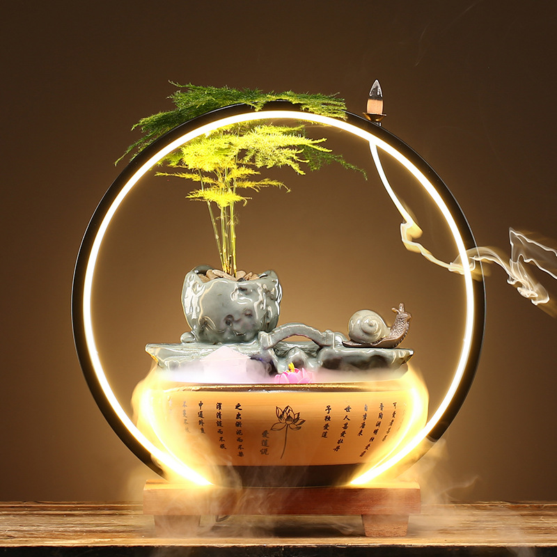 Petit pont d'eau qui coule-amour lotus dit-surplombant escargot-asp