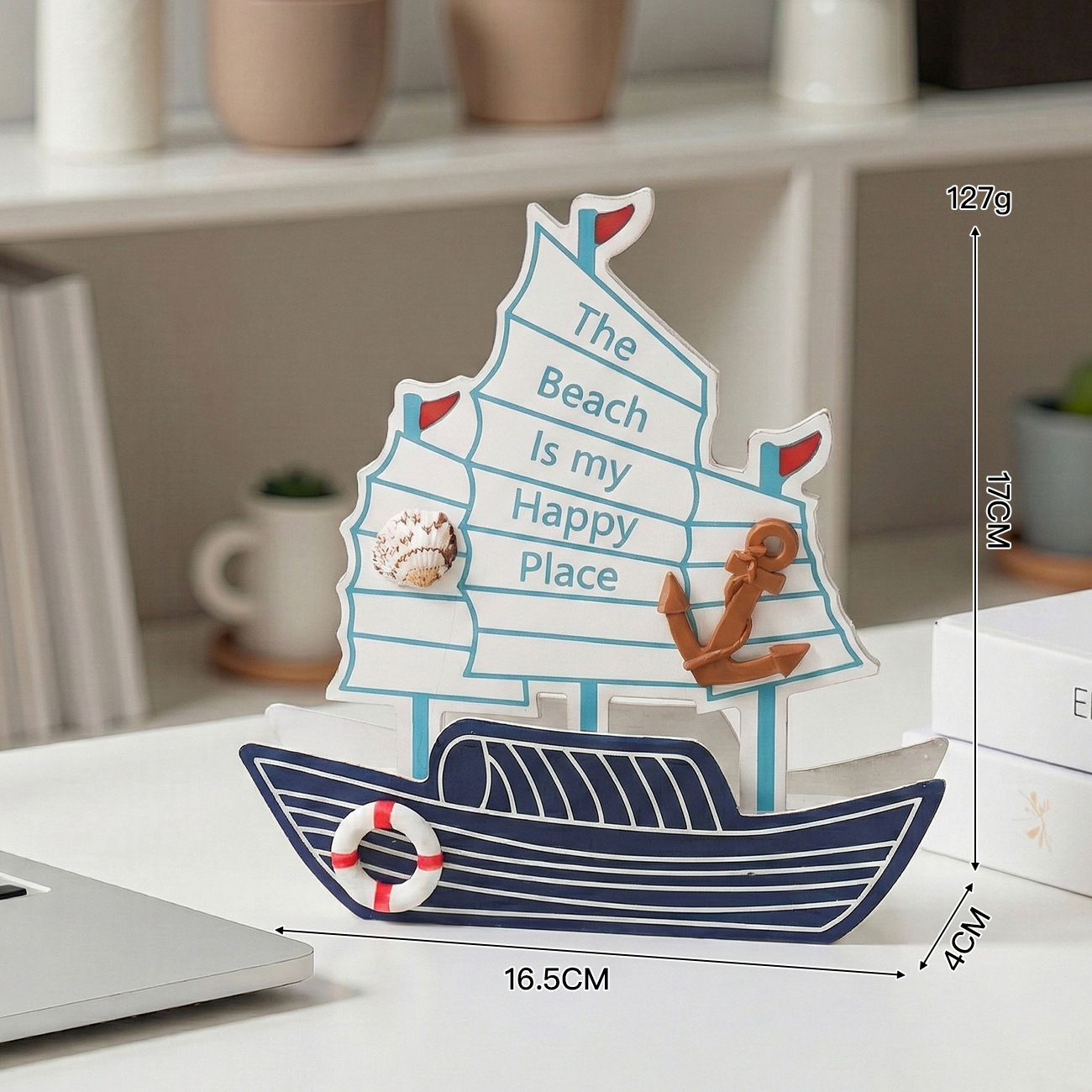 Small double-sided English sailboat anchor