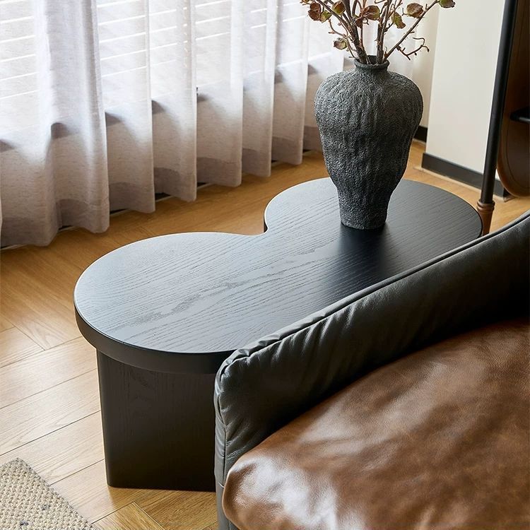 (Black butterfly-shaped single unpainted side table)