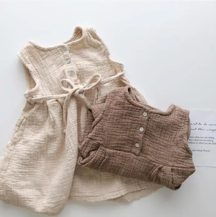 Bébé fille couleur unie robe mode portant du coton musulman usine vente en gros bébé enfants été Bage à manches courtes Satin filles