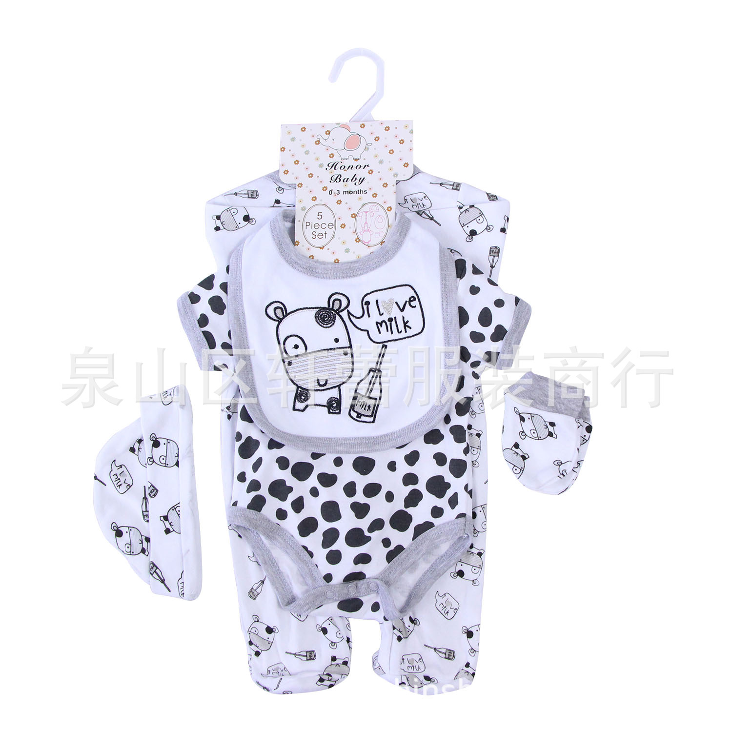 Ropa de bebé con estampado de vaca.