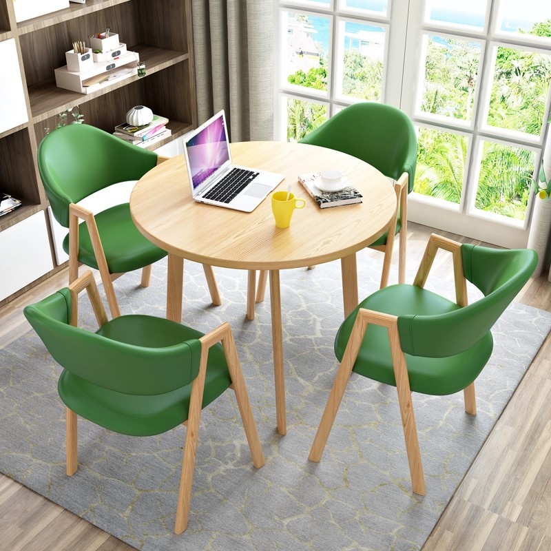 Cuero verde 4 sillas + mesa redonda color madera 80