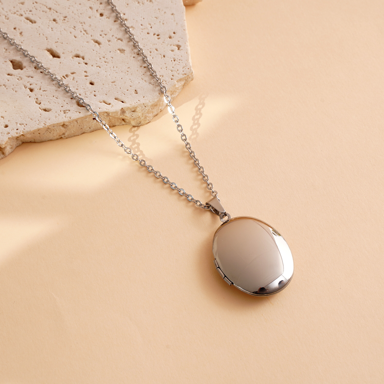 Steel color oval phase box-24x29mm