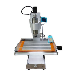 Tipo de Pilar Enrutador CNC de 5 ejes 3040 Máquina de talla de madera Fácil de operar Sistema de control Mach3 Columna Tipo de mesa - Product Image 3