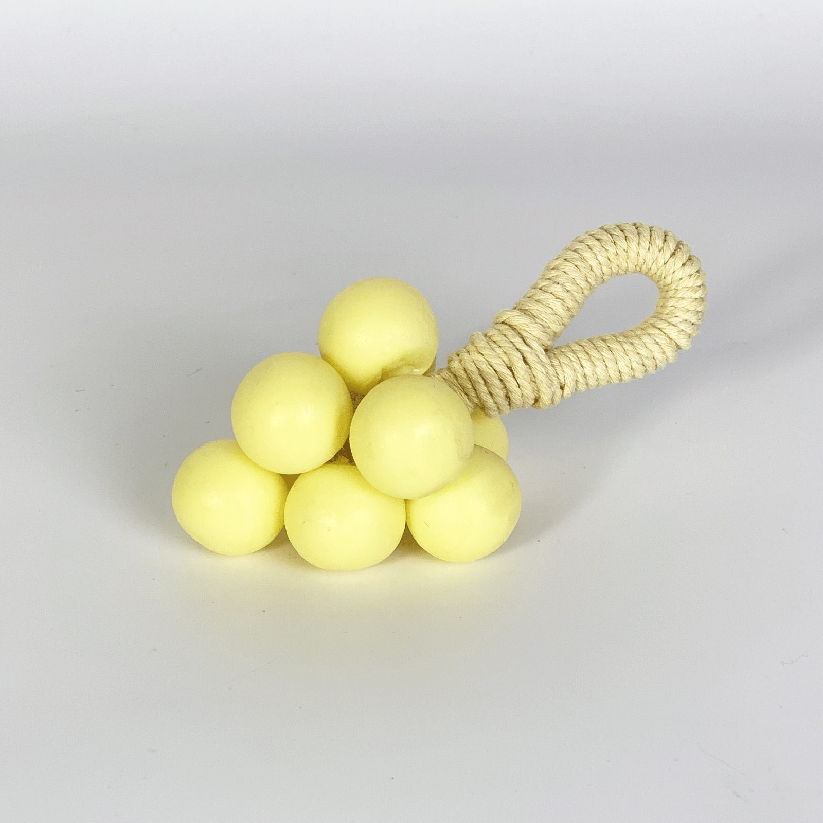 Macaroon yellow-naked string