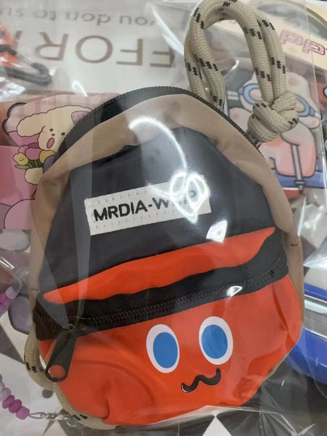 Mochila pequeña naranja tipo WMouth