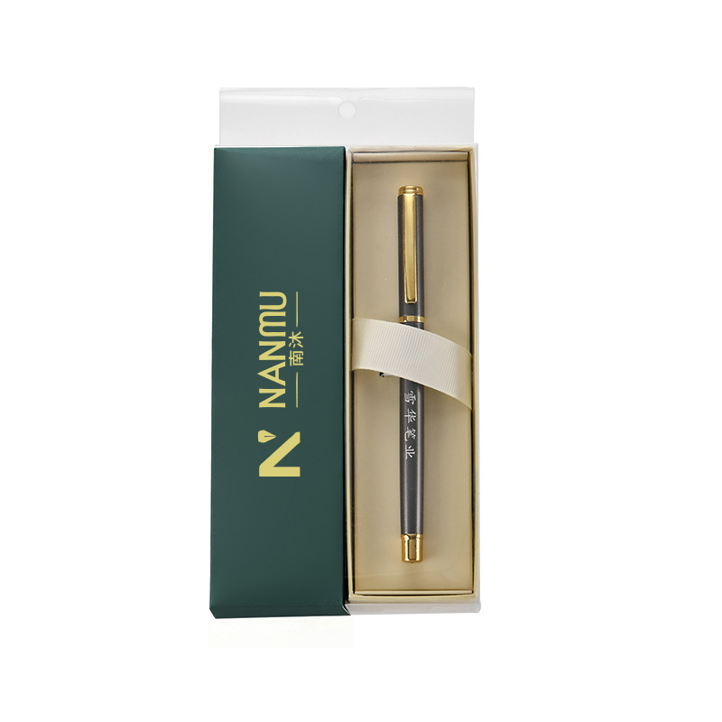 The dark green box contains (one 1902 grey-barreled gold-handled pen).