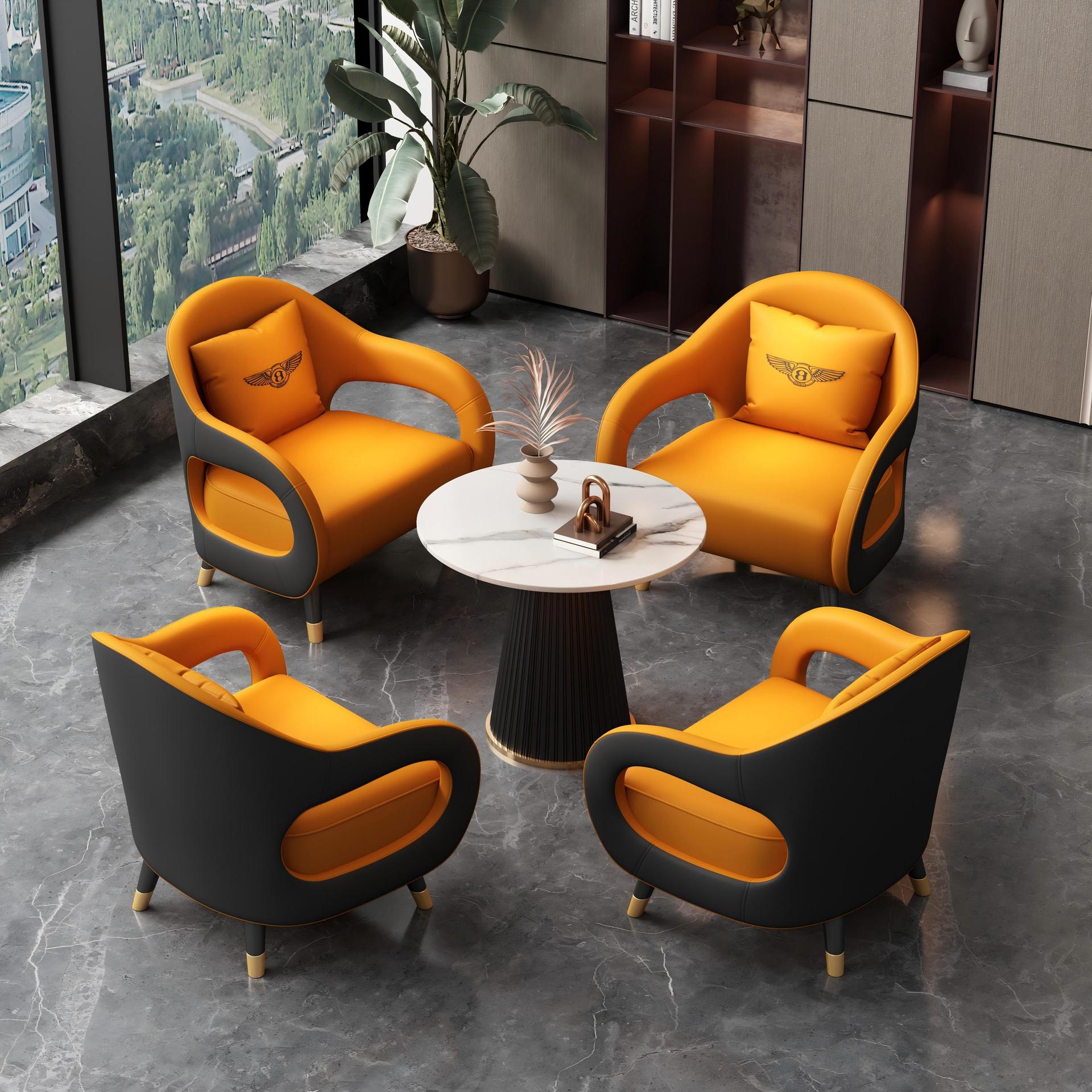 A table and four chairs (orange and black)
