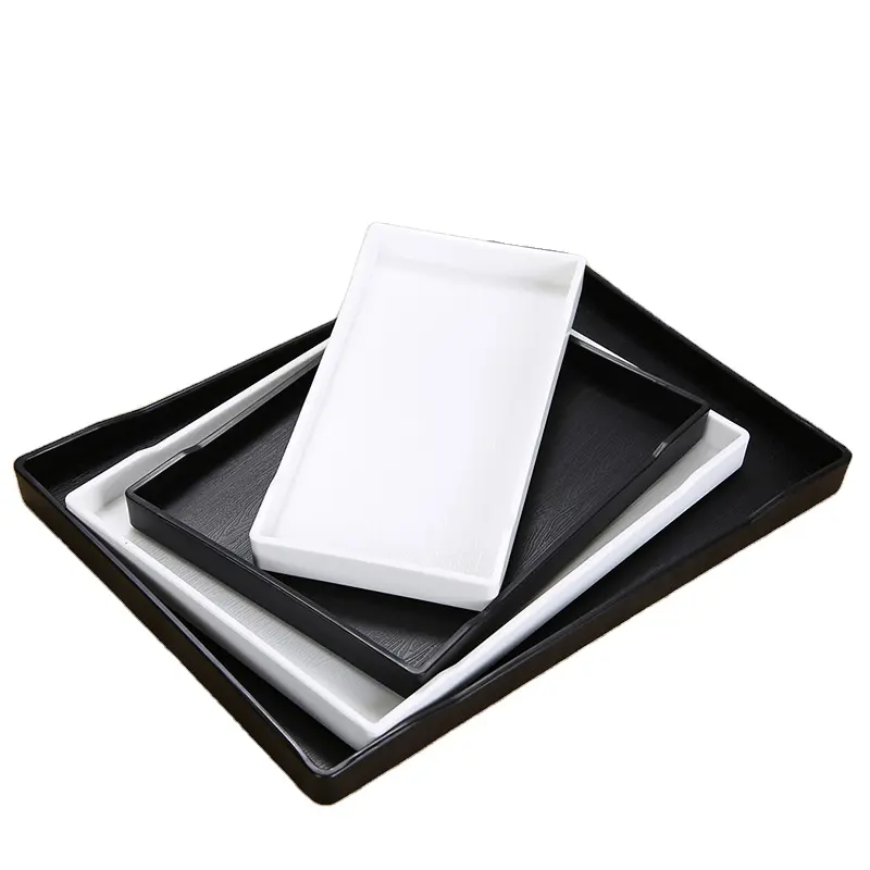 Plateau imperméable blanc noir de plateau de nourriture en plastique anti-dérapant de texture en bois durable de restaurant pour l'hôtel