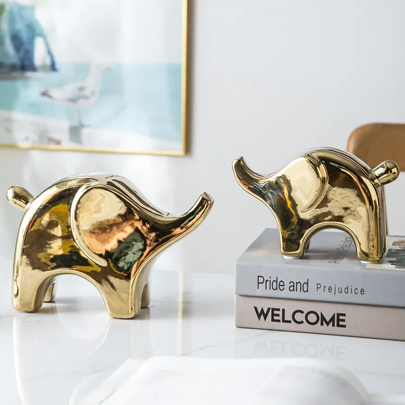 Venda quente interior moderno nórdico mesa sala decoração ouro cerâmica elefante arte estátua ornamentos de animais luxo decoração de casa